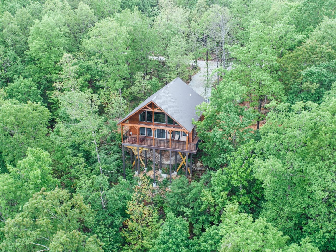 The Wanderlust Cabin in its secluded treetop setting.