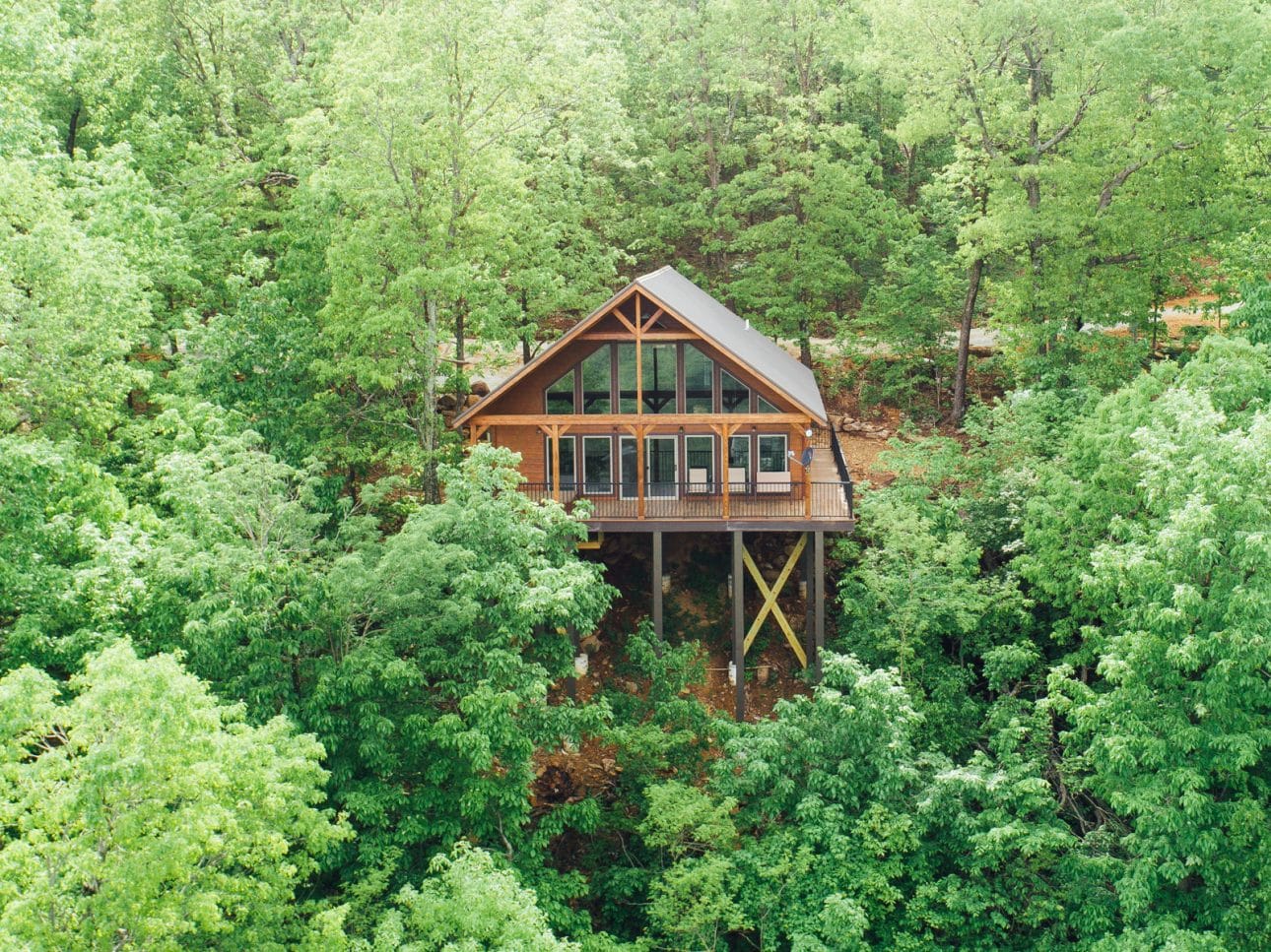 Surround yourself with the treetops of Buffalo River country in the Wildwood Cabin,.