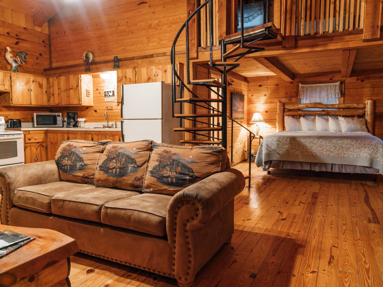The main floor of the Mountain Magic Cabin features a spacious setting for relaxation with family, friends or just two!