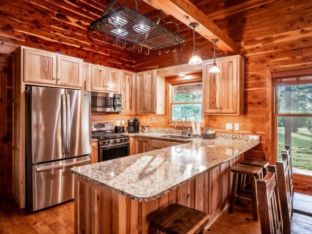 Whip up a hearty meal for your family or friends in the Big Sky Cabin's large, fully-appointed kitchen.
